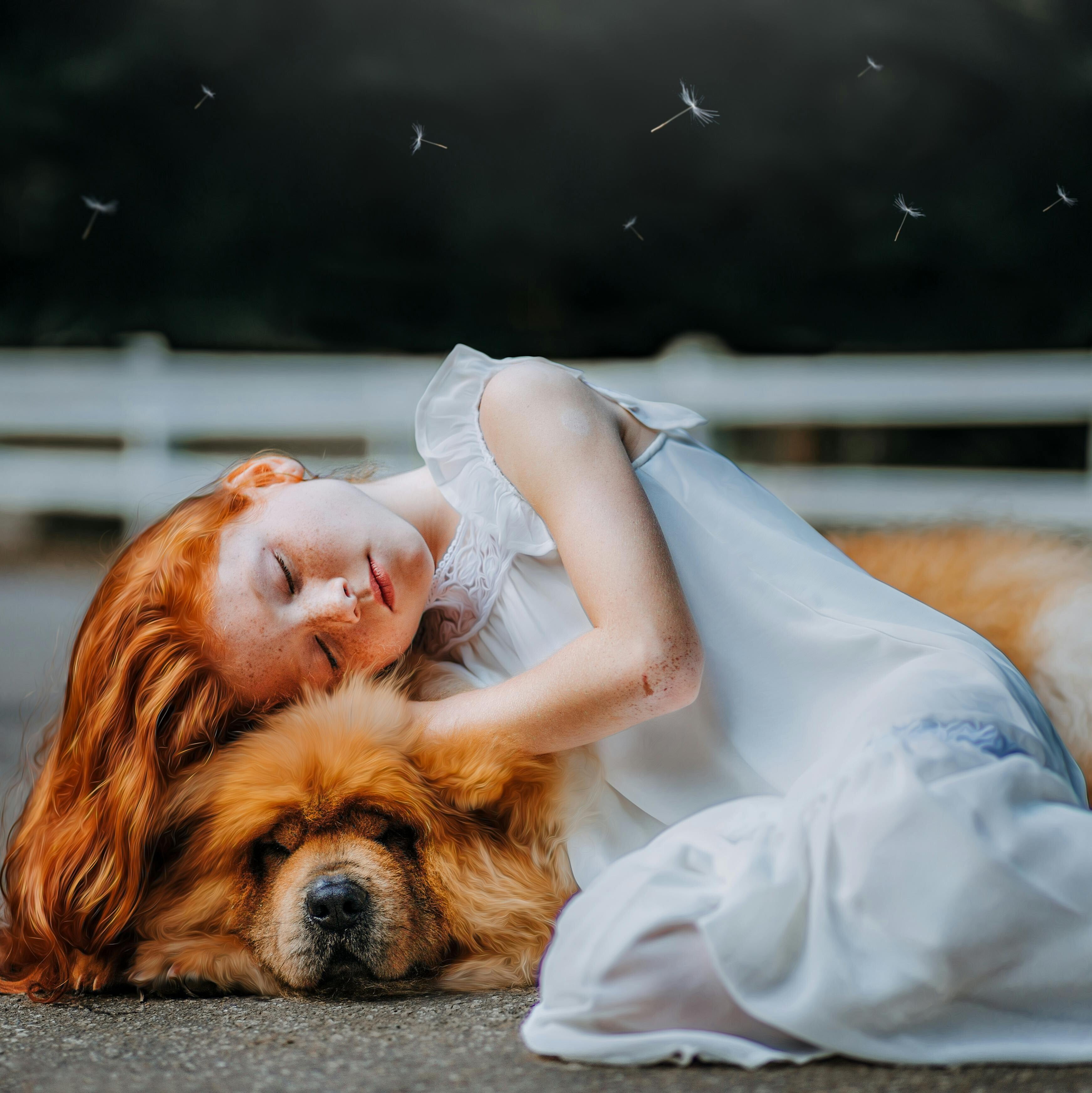 girl enjoying time with her dog