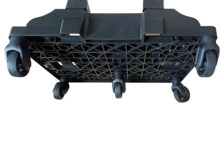Black plastic component with geometric pattern on a white background