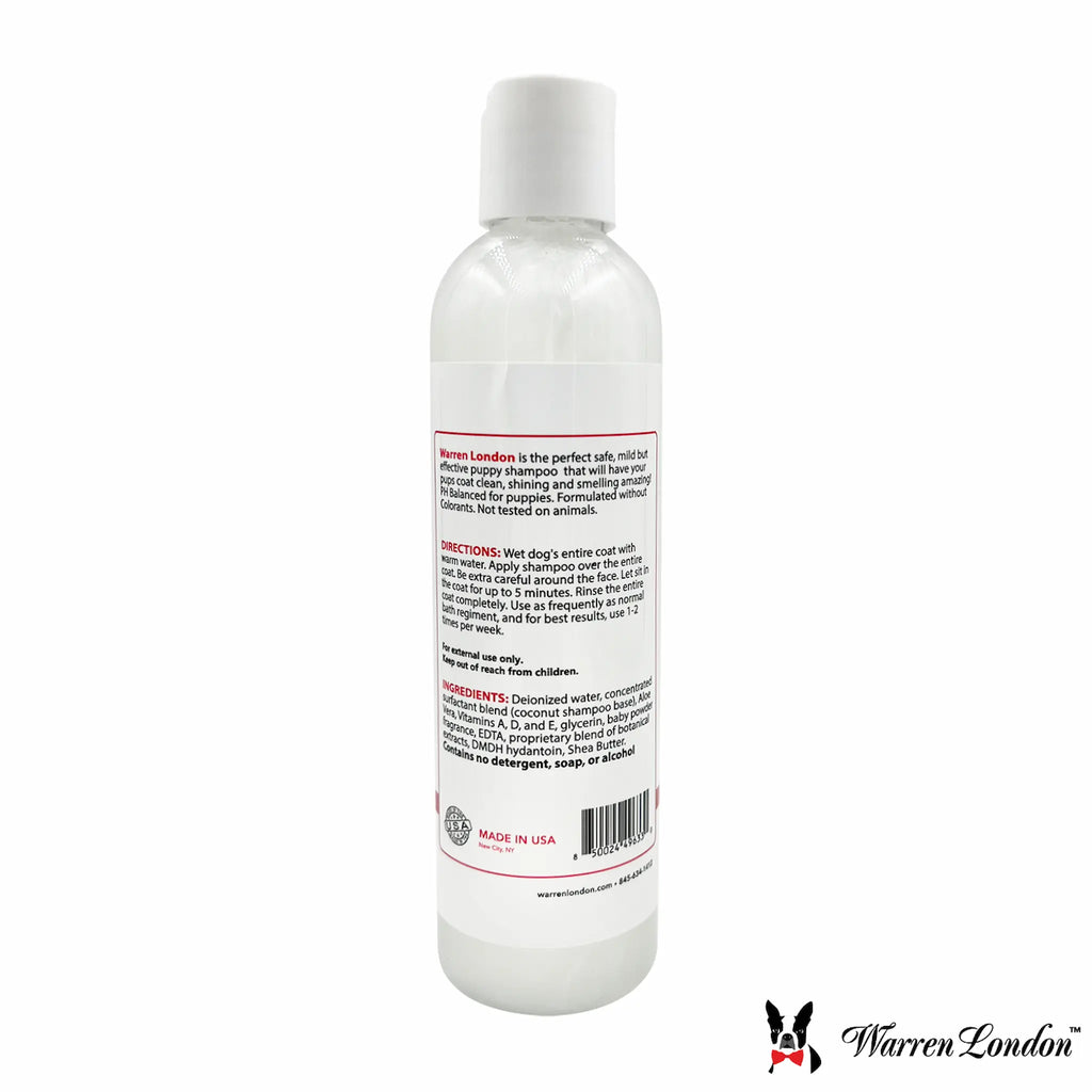 White bottle of Warren London shampoo with label on a white background