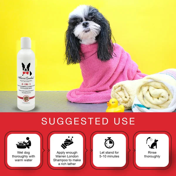 Dog wrapped in a pink towel with a bottle of Warren London shampoo on a yellow background