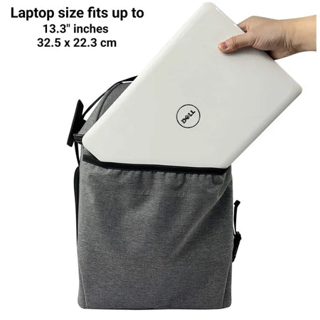 Gray backpack with a Dell laptop being placed inside, showing capacity for up to 13.3" laptops.