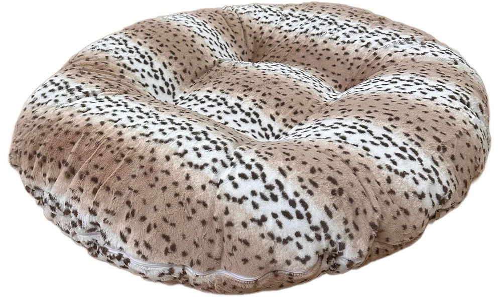 Round donut-shaped pet bed with a cheetah print pattern on a white background