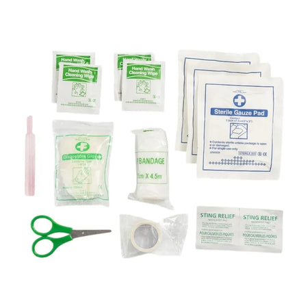 Collection of first aid supplies including bandages, gauze pads, and cleaning wipes on a white background.