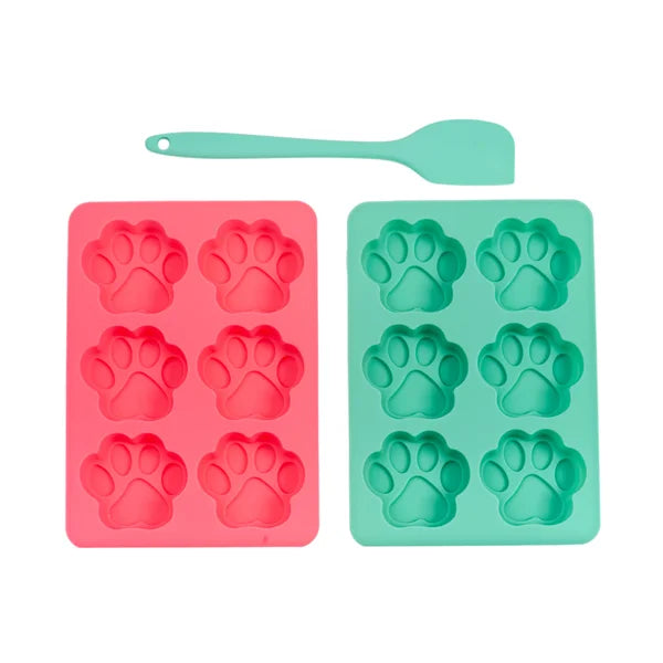 Two silicone molds with paw prints, one red and one green, on a white background.