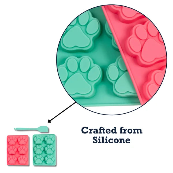 Silicone mold with paw prints and a spatula on a white background, labeled 'Crafted from Silicone'.