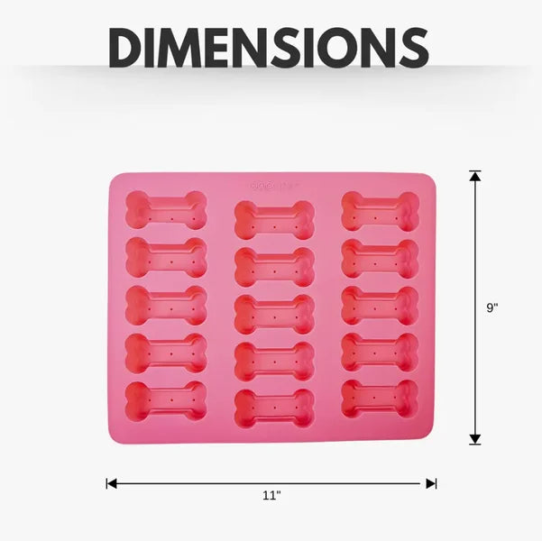 Pink silicone mold with bone-shaped cavities and dimensions labeled on a white background
