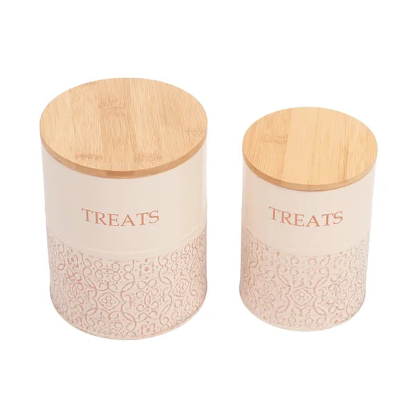 Two treat jars with wooden lids on a white background