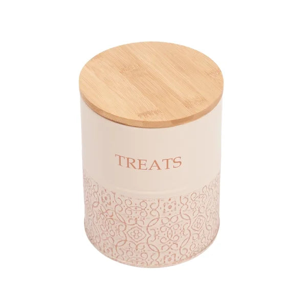 Decorative treat jar with wooden lid on a white background