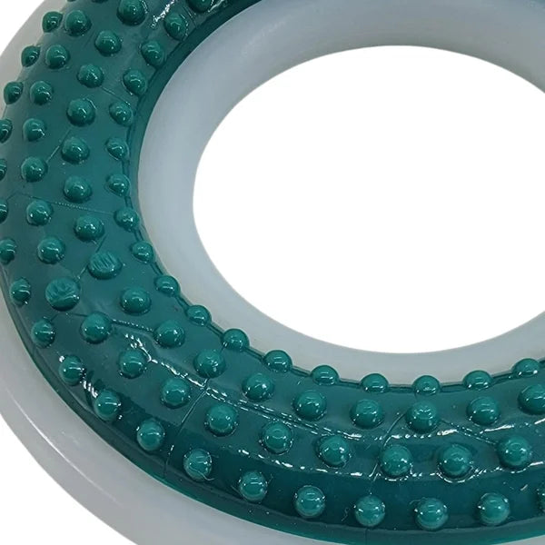 Teal circular object with textured surface on a white background