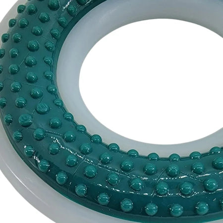 Teal circular object with textured surface on a white background