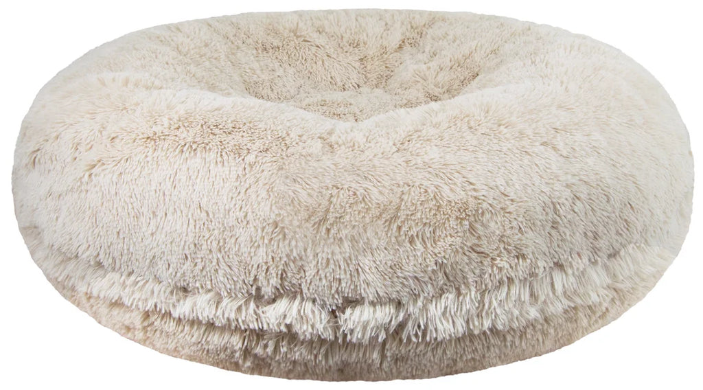 Round, plush pet bed with a soft texture on a white background