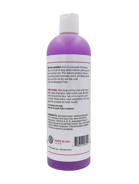 Purple bottle ofaven London dog shampoo with label on a white background
