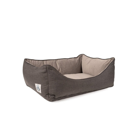 Gray pet bed with beige interior on a white background