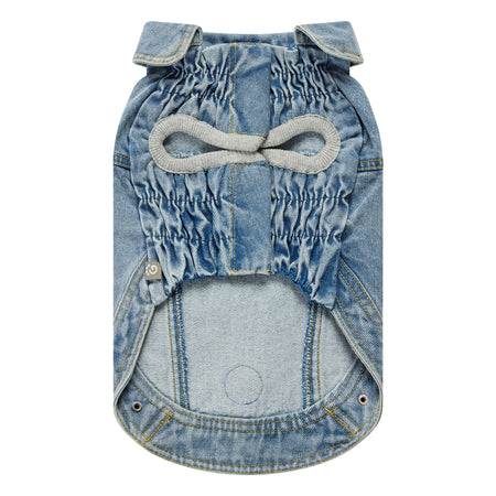 Denim dog dress with bow detail on a white background