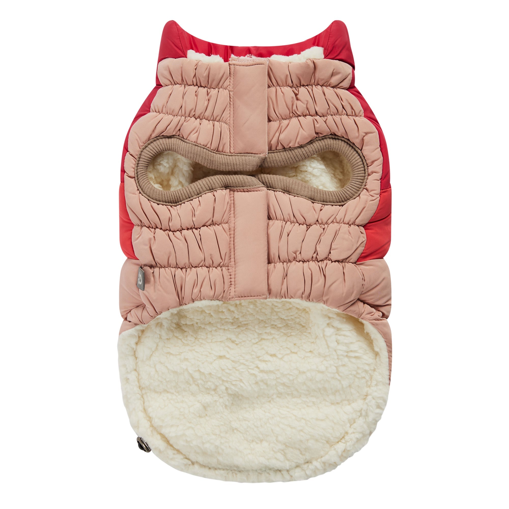 Dog coat with red, pink, and cream colors on a white background