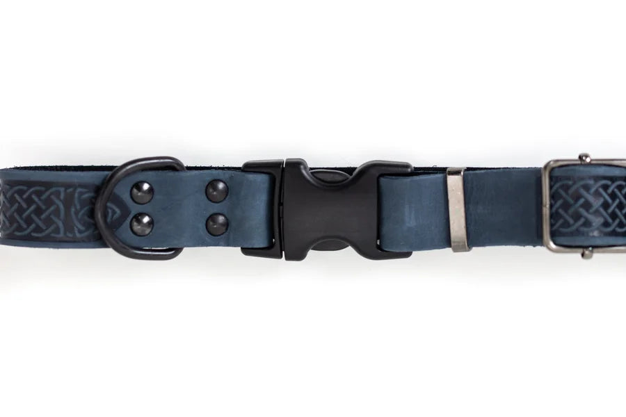 Navy blue dog collar with a black buckle on a white background