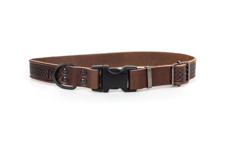 Brown leather belt with black buckle on a white background