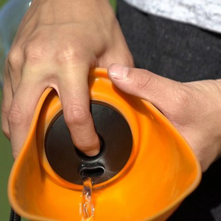 Fold-A-Bowl Portable Water Bottle and Bowl for Dogs - Flipo using orange