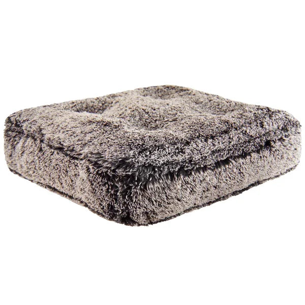 Fluffy gray pet bed on a white background