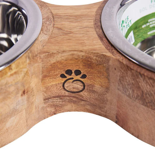 Wooden pet bowl with two metal compartments on a white background