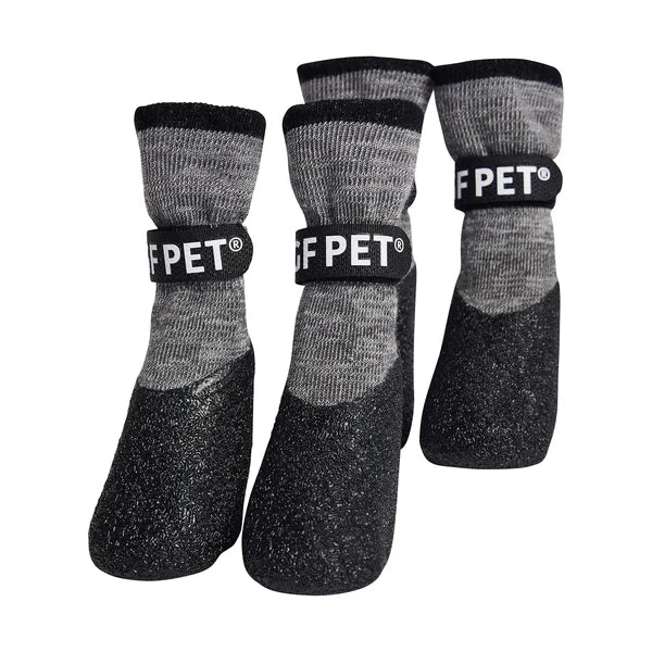 Three pairs of gray pet socks with black soles and FPET branding on a white background.