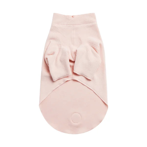 Pink dog sweater with a bow on a white background