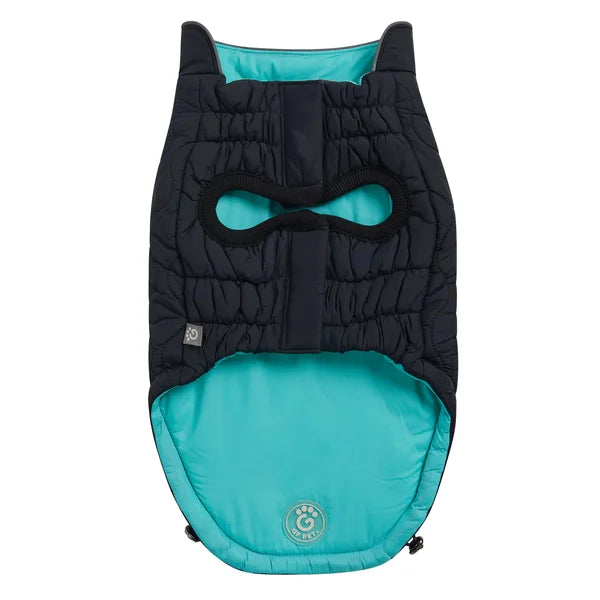 Black and teal baby bunting with a mask design on a white background