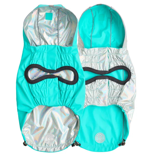 Turquoise and silver dog raincoat with reflective accents on a white background