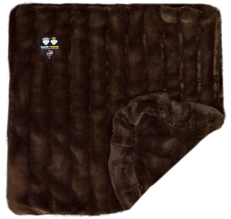 Brown faux fur blanket with a brand logo on a white background