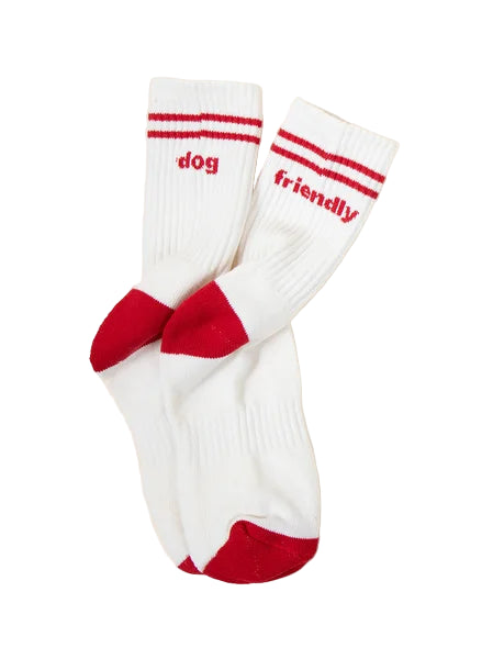 White socks with red accents and text on a beige background