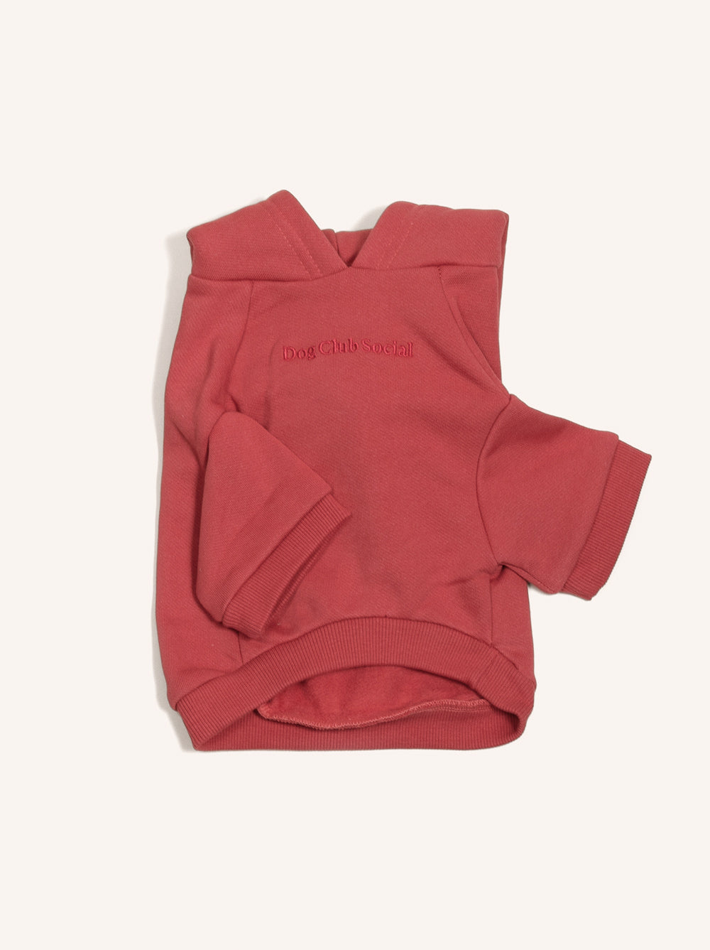 Red dog hoodie with text on a white background