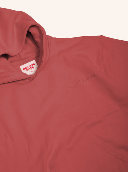 Red hoodie with a brand logo on a white background