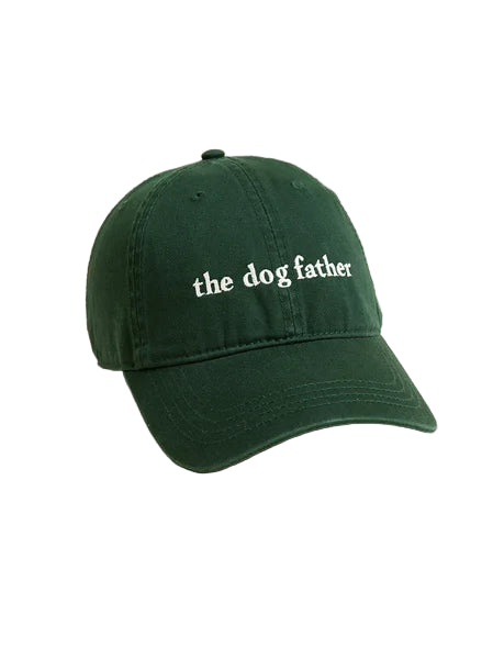 Green cap with 'the dog father' text on a beige background