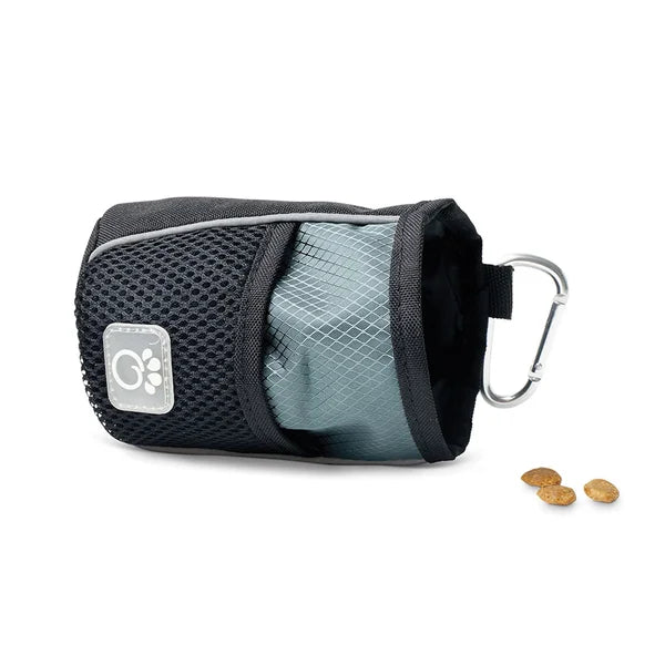 Pet treat pouch with carabiner and pet treats on a white background