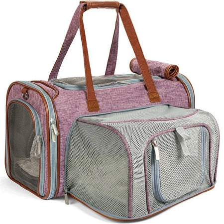 Pet carrier with pink and gray design on a white background