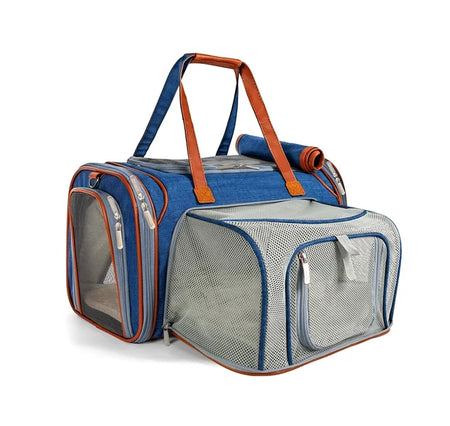Blue and gray pet carrier with orange accents on a white background