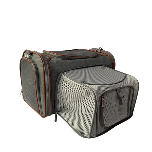 Gray pet carrier with mesh side on a white background