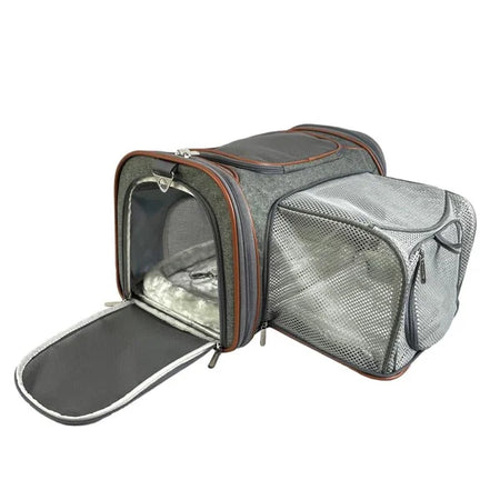 Pet carrier with transparent side panels on a white background