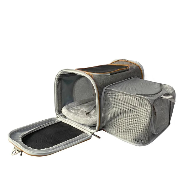 Pet carrier with open lid on a white background