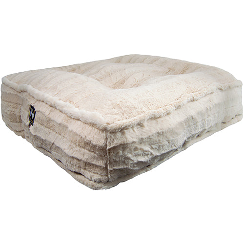 Beige pet bed with plush texture on a white background