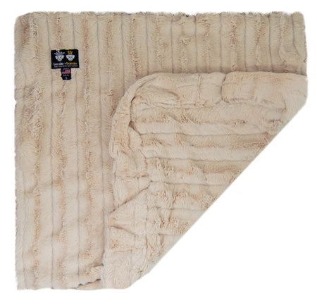 Beige textured blanket with a brand tag on a white background
