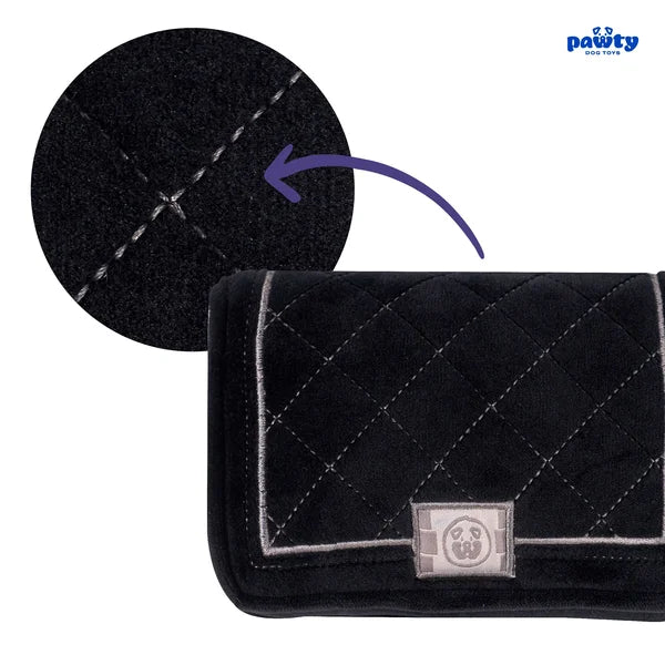 Black quilted product with a close-up of stitching detail and 'pawty' branding.