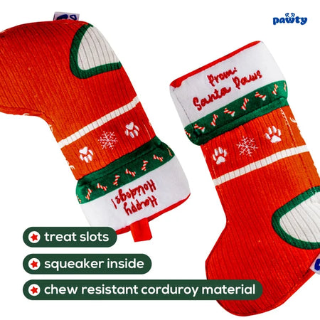 Red dog toy with green and white accents featuring text and paw prints on a white background.