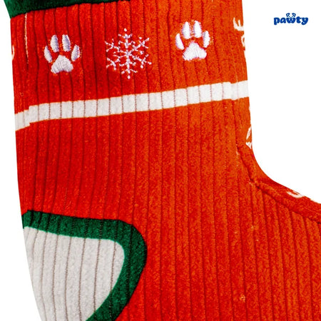 Red sock with paw print and snowflake patterns on a white background, featuring the brand 'pawty'.