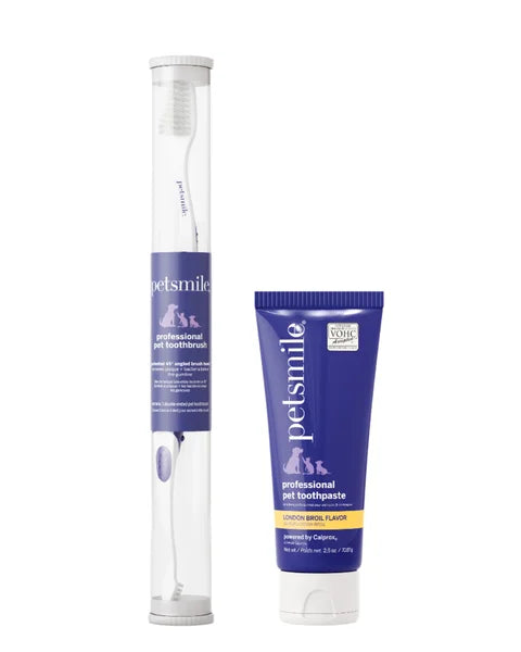 Petsmile pet toothbrush and tube of pet toothpaste on a white background