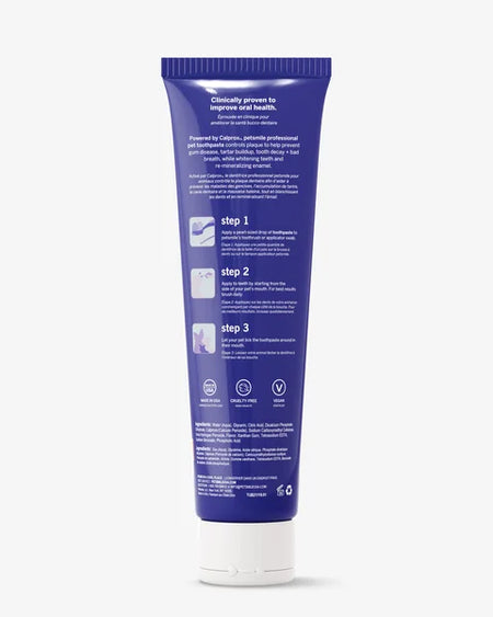 Blue tube of dental product with white text on a white background