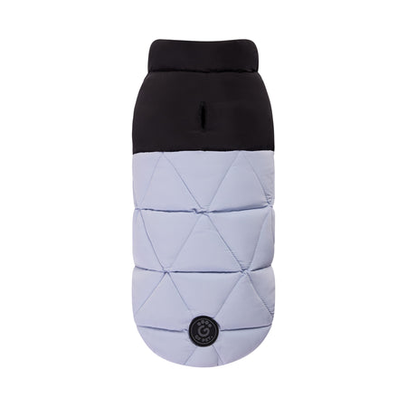 Quilted dog coat with black top and light gray bottom on a white background