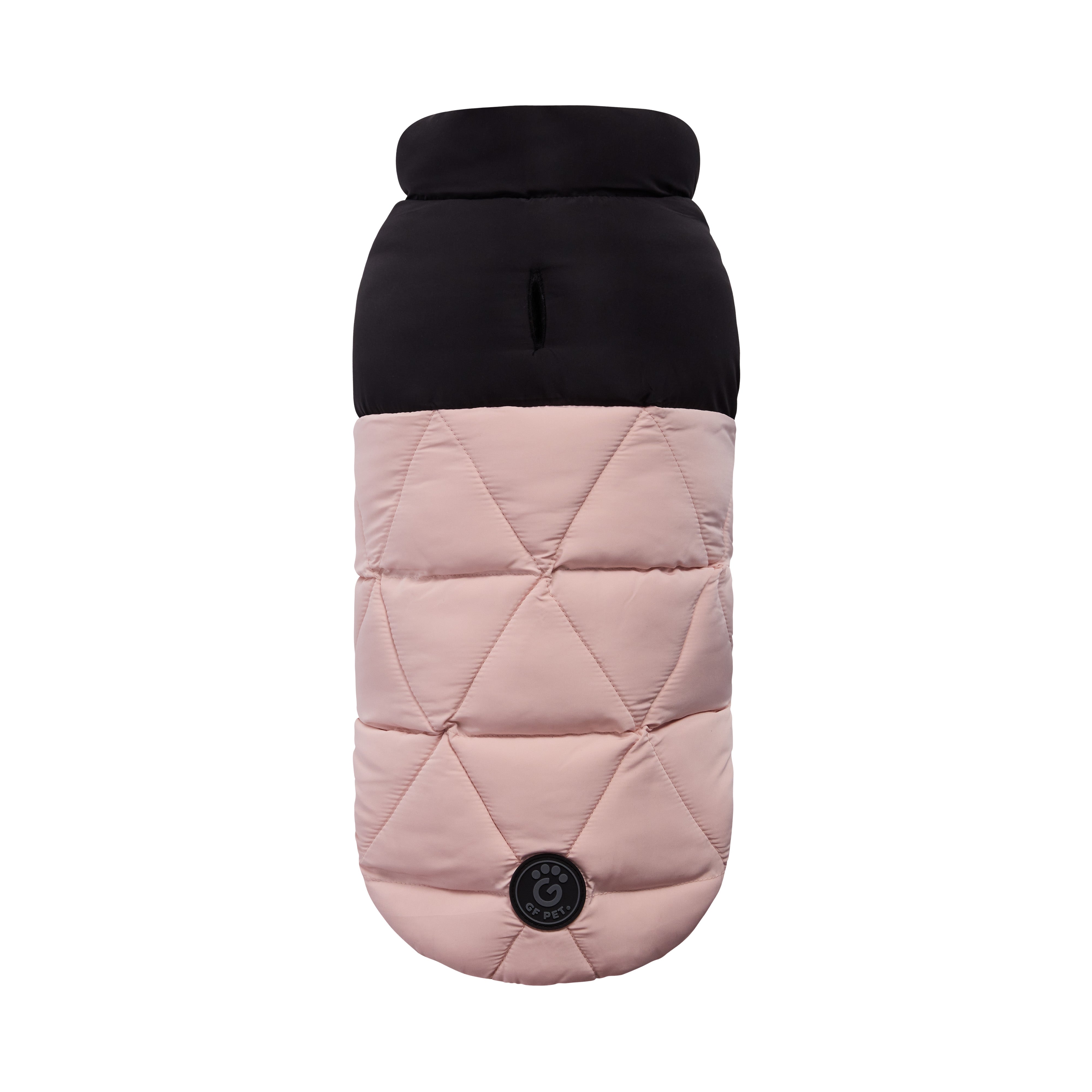 Quilted dog coat with black top and pink body on a white background