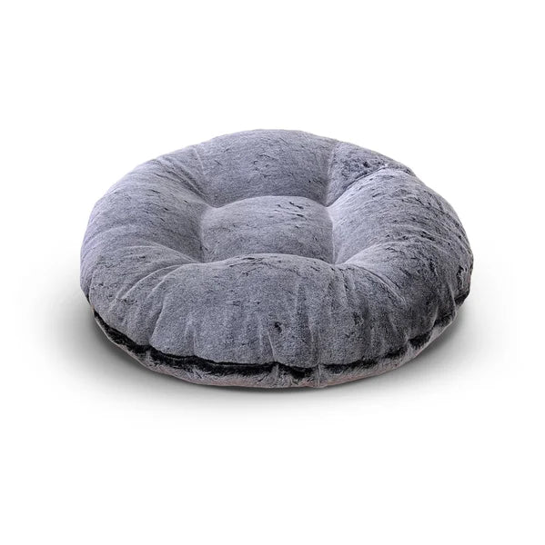 Gray donut-shaped pet bed on a white background