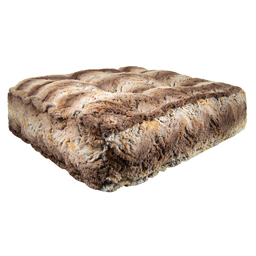 Brown textured cushion on a white background